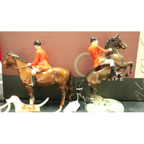 161 - Two Beswick horses with huntsmen, Beswick fox and five Beswick hounds. Not available for in-house P&... 