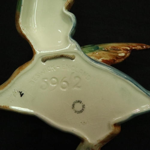 162 - Set of four Beswick flying ducks (5961, 5962, 5963, 5964), some damages. Wing re glued on number thr... 