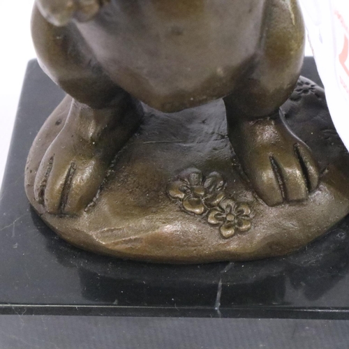 340 - Bronze Rabbit holding an egg, signed Milo, H: 12 cm. P&P Group 1 (£14+VAT for the first lot and £1+V... 