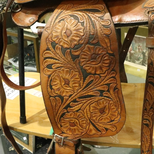 382 - Original heavily tooled American short saddle complete with fittings straps etc, never used. Not ava... 