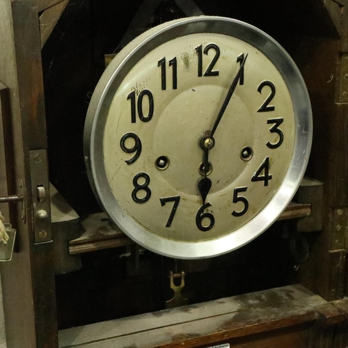 387 - Junghans 20th century oak granddaughter clock, with glazed pendulum display and Westminster chimes, ... 