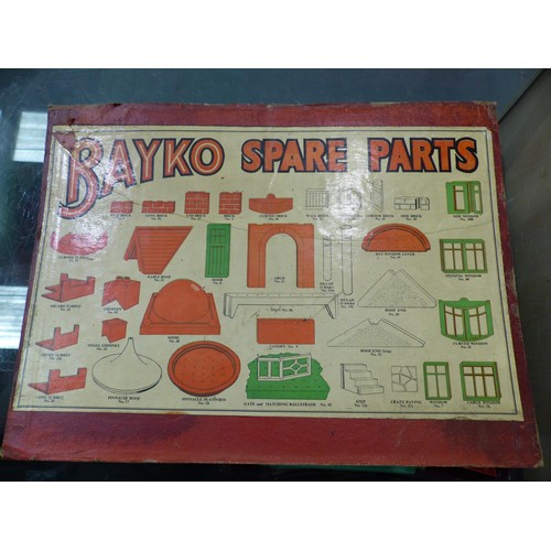 2126 - Large quantity of Bayko pieces , bricks, roof, bases, windows, doors, books etc. Contains three stor... 