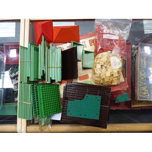 2126 - Large quantity of Bayko pieces , bricks, roof, bases, windows, doors, books etc. Contains three stor... 