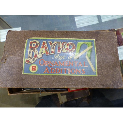 2129 - Ten Bayko set boxes containing quantity of parts, books etc. Contents of sets unchecked, boxes mostl... 