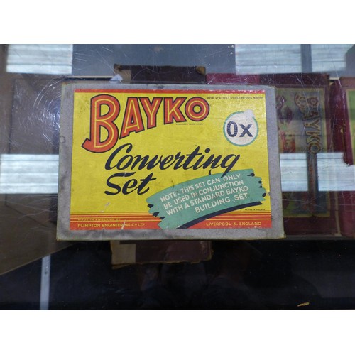 2129 - Ten Bayko set boxes containing quantity of parts, books etc. Contents of sets unchecked, boxes mostl... 