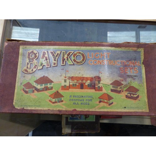 2129 - Ten Bayko set boxes containing quantity of parts, books etc. Contents of sets unchecked, boxes mostl... 