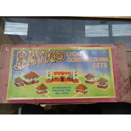 2129 - Ten Bayko set boxes containing quantity of parts, books etc. Contents of sets unchecked, boxes mostl... 