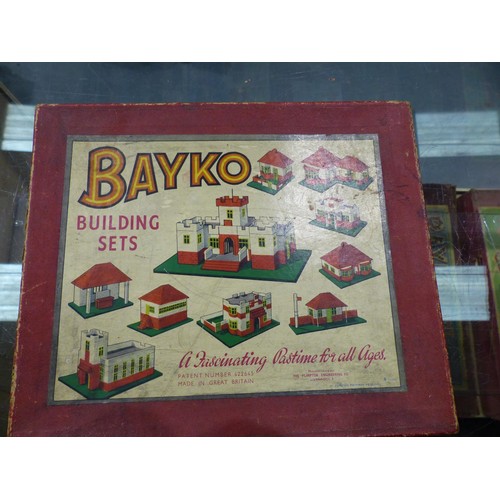 2129 - Ten Bayko set boxes containing quantity of parts, books etc. Contents of sets unchecked, boxes mostl... 