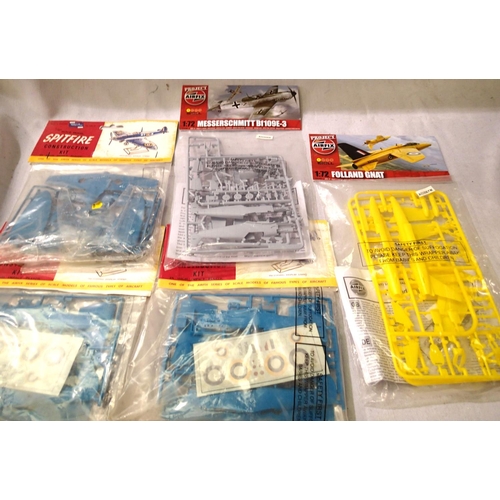 2062 - Five Airfix bagged kits comprising of three Spitfire, Folland Gnat, BF109-3. All sealed in bags with... 