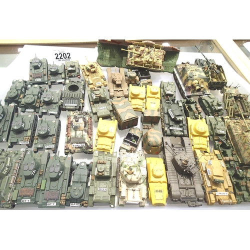 2202 - Selection of Wargaming 1/72 scale military vehicles, plastic and metal, finished to an excellent sta... 