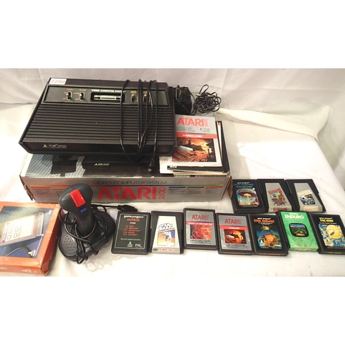 2366 - 1982 Atari 2600 video computer system, boxed with Pacman and nine further game cartridges, some have... 