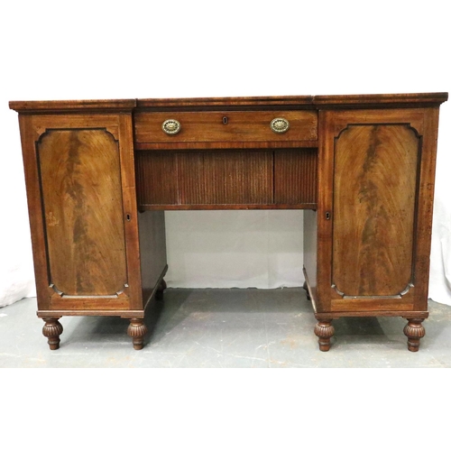 3106 - A Regency mahogany twin pedestal sideboard, each cupboard fitted with drawers and cellarette, the ce... 