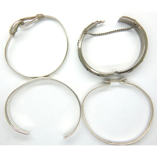 5 - Three 925 silver bangles, combined 43g and a further white metal bangle. P&P Group 1 (£14+VAT for th... 