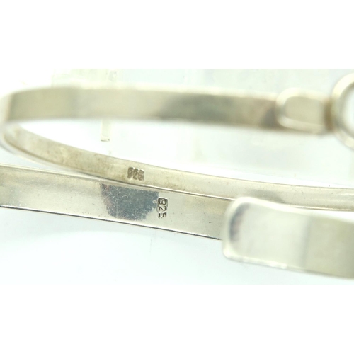 5 - Three 925 silver bangles, combined 43g and a further white metal bangle. P&P Group 1 (£14+VAT for th... 