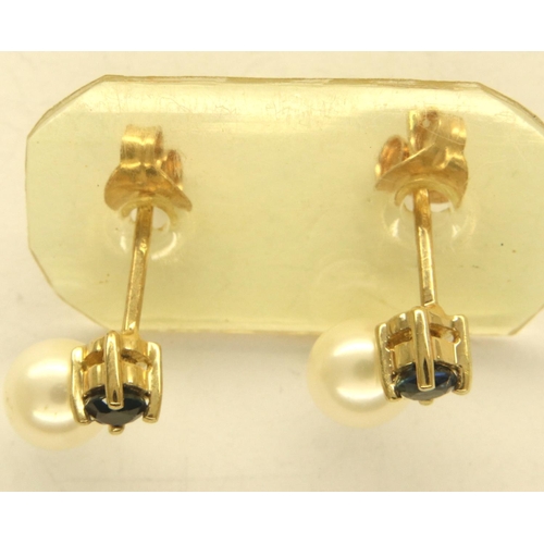 56 - 9ct gold freshwater pearl and blue sapphire earrings, with certificate, combined 1.1g. P&P Group 1 (... 