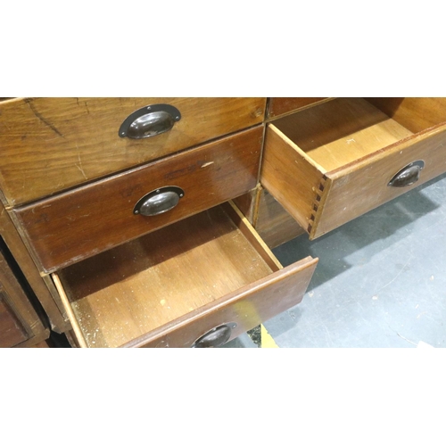 3052 - A mid 20th century haberdashery counter, having sixteen graduated drawers, by shop fittings Manchest... 