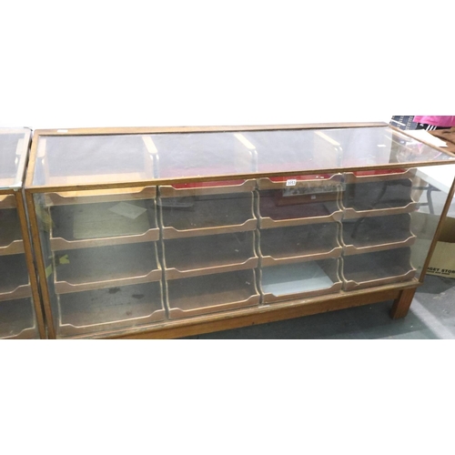 3053 - A mid 20th century haberdashery counter, having sixteen graduated drawers, by shop fittings Manchest... 