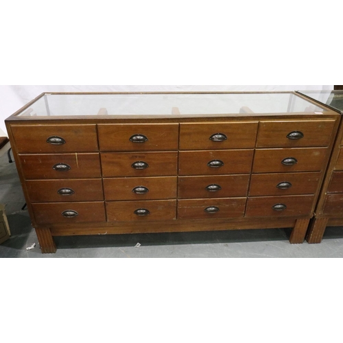 3053 - A mid 20th century haberdashery counter, having sixteen graduated drawers, by shop fittings Manchest... 