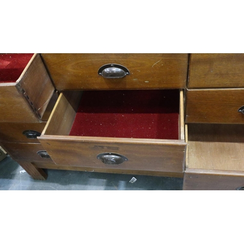 3053 - A mid 20th century haberdashery counter, having sixteen graduated drawers, by shop fittings Manchest... 