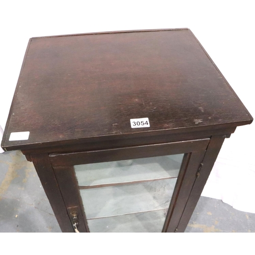 3054 - An early 20th century oak glazed shop display cabinet with two interior shelves. Not available for i... 