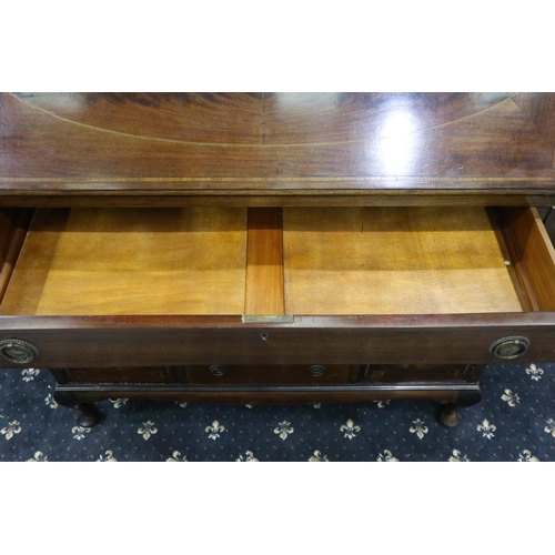 3064 - An Edwardian inlaid walnut bureau, the top fitted with drawers and pigeonholes above an unusual base... 