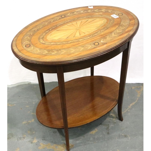 3071 - An early 20th century marquetry inlaid walnut oval table, having under shelf and shaped tapering sup... 