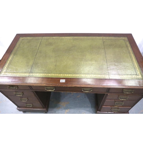 3072 - An Edwardian inlaid mahogany twin pedestal desk having two banks of four drawers and gilt tooled lea... 