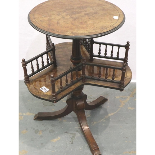 3074 - An unusual burr walnut etagere, in the form of a lamp table with three open galleried shelves below,... 