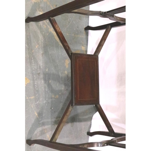 3081 - Goodall and Sons of Newcastle: An Edwardian inlaid walnut lamp table with crossed stretchers and und... 