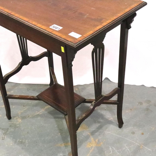 3081 - Goodall and Sons of Newcastle: An Edwardian inlaid walnut lamp table with crossed stretchers and und... 