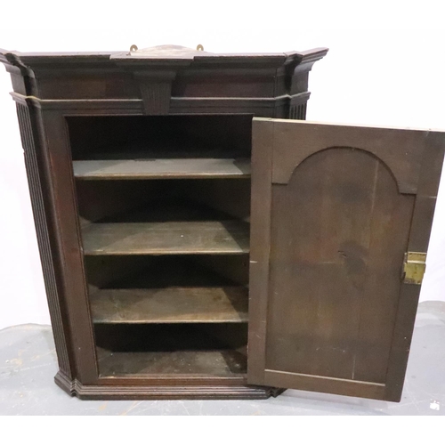 3092 - A George III oak corner cabinet with three internal shelves, with panelled door, W: 76 cm, H: 99 cm.... 