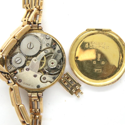 155 - Ladies boxed 9ct gold wristwatch, working but rear case detached and crystal absent. On a 1/10 9ct g... 