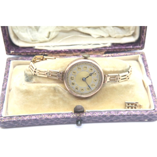 155 - Ladies boxed 9ct gold wristwatch, working but rear case detached and crystal absent. On a 1/10 9ct g... 