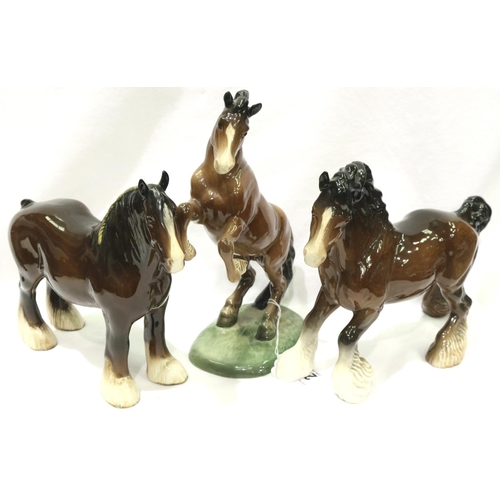 211 - Three large Beswick ceramic shire horses, various poses, largest L: 30 cm. P&P Group 3 (£25+VAT for ... 