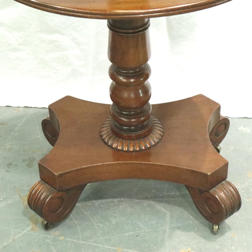 3113 - A 19th century walnut dumbwaiter, circular with three graduated tiers and raised on a quadripartite ... 