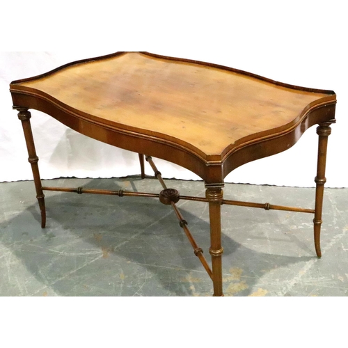 3128 - Reprodux 20th century yew coffee table, shaped, with gallery, turned supports and stretches, 77 x 46... 