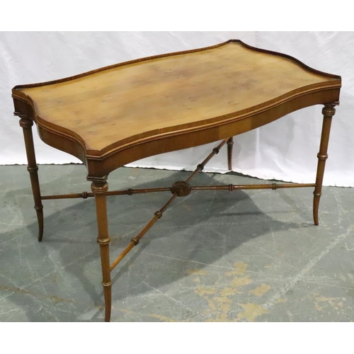 3128 - Reprodux 20th century yew coffee table, shaped, with gallery, turned supports and stretches, 77 x 46... 