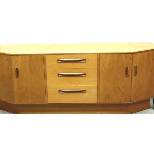 3130 - G Plan, a shaped teak sideboard of three drawers and cupboard, 186 x 45 x 73 cm H. Not available for... 