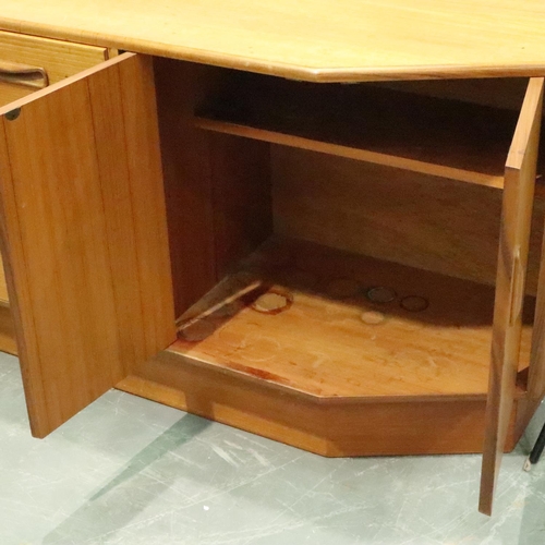 3130 - G Plan, a shaped teak sideboard of three drawers and cupboard, 186 x 45 x 73 cm H. Not available for... 