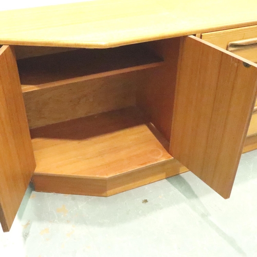 3130 - G Plan, a shaped teak sideboard of three drawers and cupboard, 186 x 45 x 73 cm H. Not available for... 