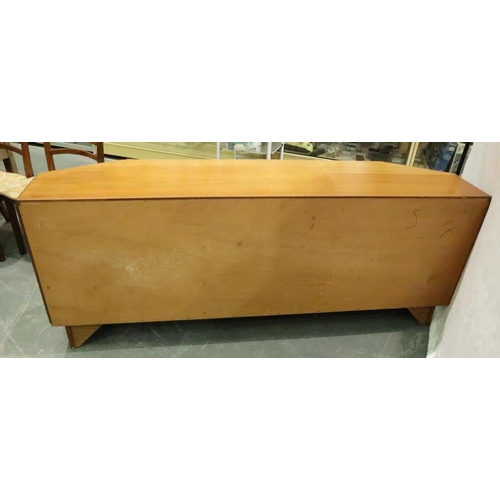 3130 - G Plan, a shaped teak sideboard of three drawers and cupboard, 186 x 45 x 73 cm H. Not available for... 