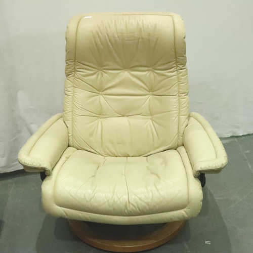 3135 - Stressless; A modern cream leather swivel recliner and footstool, some marks to leather, would benef... 