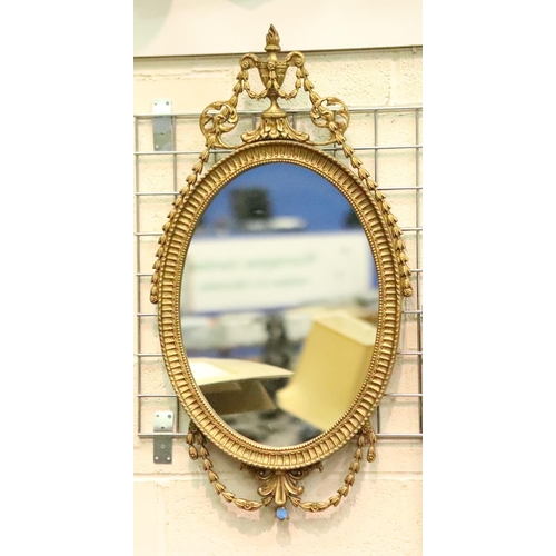 3141 - A modern Regency style gilt framed oval wall mirror, 90 x 50 cm. Not available for in-house P&P, con... 