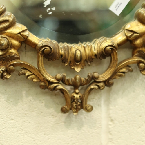 3145 - A large 20th century gilt framed oval wall mirror, overall 93 x 56 cm.  Not available for in-house P... 