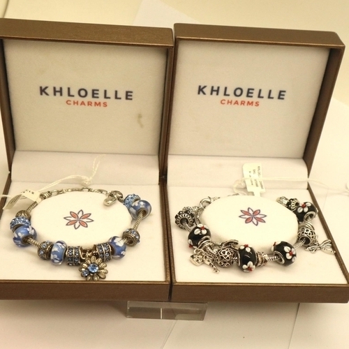 64 - Two Khloelle charm bracelets with bead charms, boxed. P&P Group 1 (£14+VAT for the first lot and £1+... 