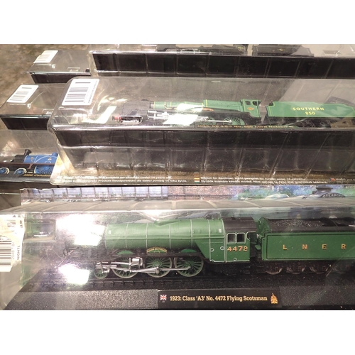 1031 - Six OO track cased resin trains mounted on plinths. Not available for in-house P&P, contact Paul O'H... 