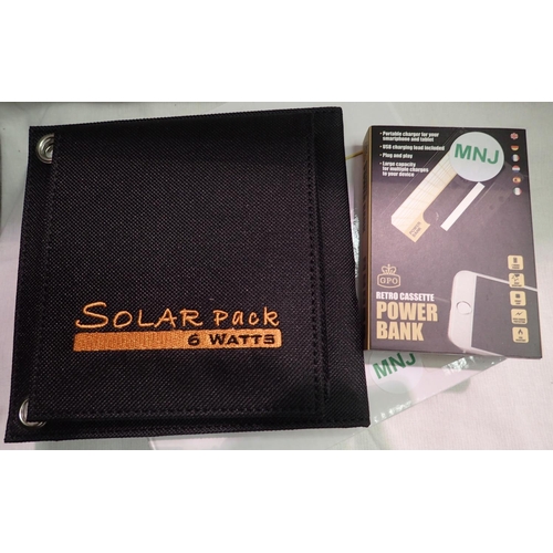 1103 - Six watt folding solar panel pack and cassette tape style power bank to recharge mobile phones and t... 