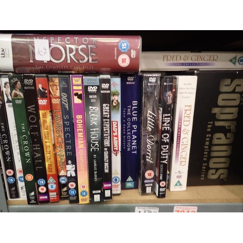 1175 - Shelf of DVDs including Morse and the complete Sopranos. Not available for in-house P&P, contact Pau... 