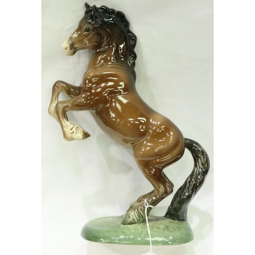 211 - Three large Beswick ceramic shire horses, various poses, largest L: 30 cm. P&P Group 3 (£25+VAT for ... 