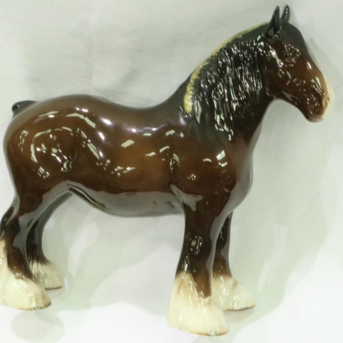 211 - Three large Beswick ceramic shire horses, various poses, largest L: 30 cm. P&P Group 3 (£25+VAT for ... 